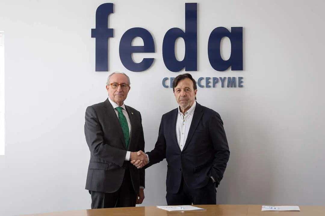 Mariano Le&oacute;n y Artemio P&eacute;rez, tras la firma del acuerdo de colaboraci&oacute;