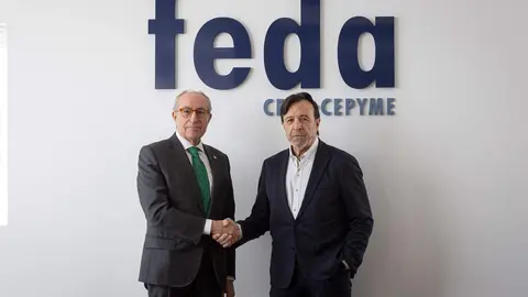 Mariano Le&oacute;n y Artemio P&eacute;rez, tras la firma del acuerdo de colaboraci&oacute;