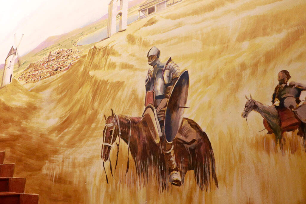 Guiño a las cuatro menciones que de Almodóvar del Campo se hacen expresamente en El Quijote